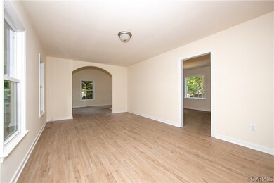 Great room with arched doorway