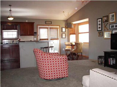 The floorplan is open and has a vaulted celing.