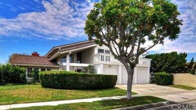 Three garages plus driveway parking.