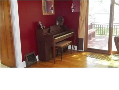 Formal dining room has the perfect spot for a pian