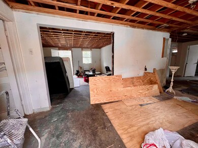 View facing living room towards front door.
