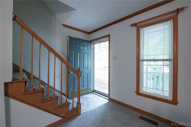 Center Hall entry with new Luxury Vinyl Tile.  Not