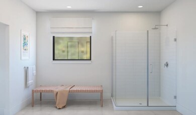 Primary bath with glass shower enclosure