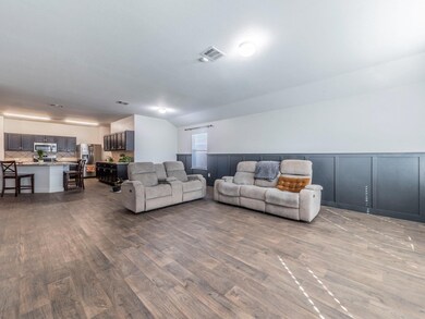 Living area with dark wood finished floors