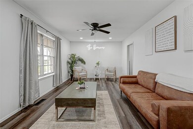 Living room featuring dark hardwood / wood-style f