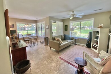 Living room with plenty of natural light, ceiling 
