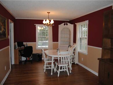 Dining Room w/ Natural Hardwood Flooring. Built in