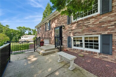 Welcome guests into the home from a spacious front
