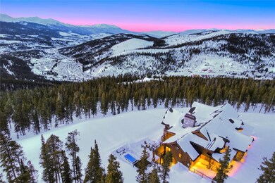 Snowy aerial view featuring a mountain view