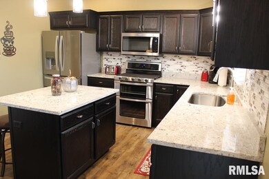 1268 W 61st St, Davenport, IA 52806 - photo 3