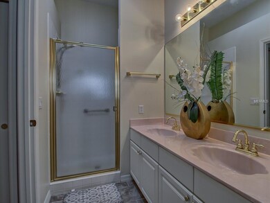 AT ENTRANCE TO MASTER BATH...HIS/HER WALK-IN CLOSE