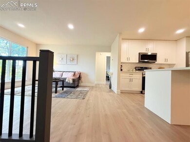 backsplash, and light countertops
