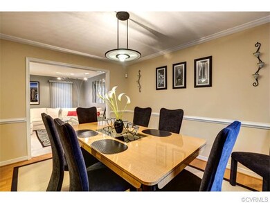 With moldings and chandelier