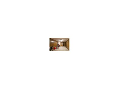 Lower level family room nook. Seller has painted t