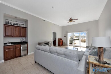 We bar, Tile flooring, crown molding, Ceiling fans, 11' ceiling