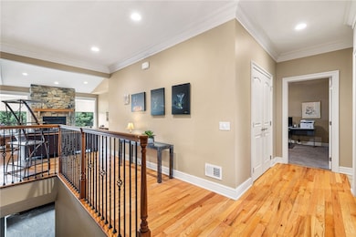 Wood floors on  the first floor entry