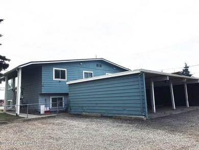 W 56th carport view
