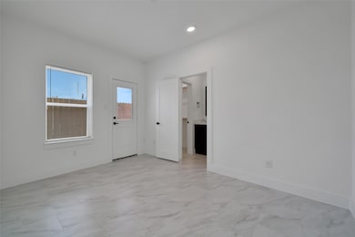 Or could be use for any family or friend visitors. It features a window and a door leading outside.