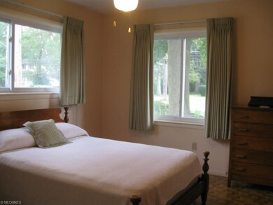 One of two FIRST FLR. bedrooms with parquet floor 