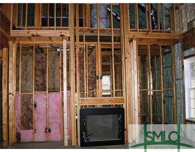 Interior Space/Layout. Greatroom fireplace with si