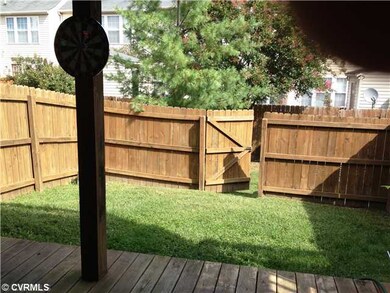 Exterior Back - Back yard with privacy fence and n