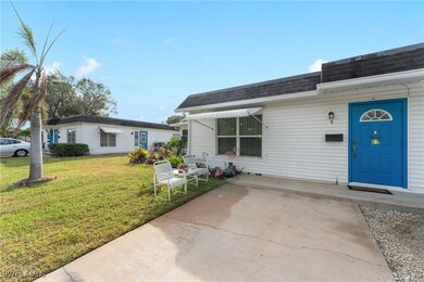View of front of house featuring a front lawn