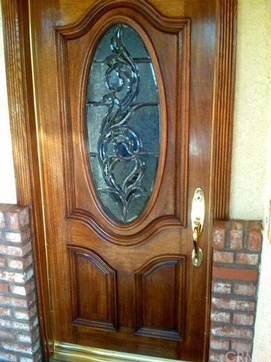 Mahogany Door with all Baldwin Hardware