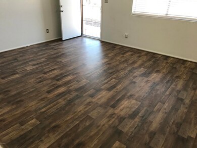 N 16TH DR NEW FAUX WOOD FLOORING