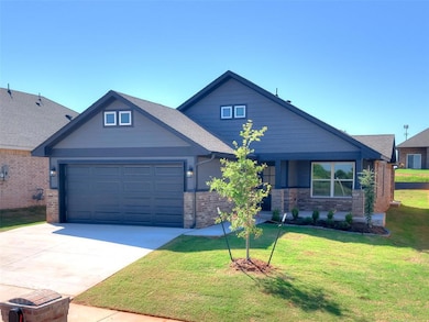 Craftsman-style home featuring brick siding, a front lawn, a garage, concrete driveway, and roof with shingles