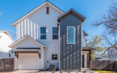 View of front of home featuring board and batten 