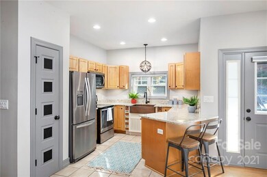 Granite Countertops,  Added Breakfast Bar & SS Appliances