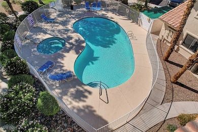 Community pool featuring a patio area and a commun