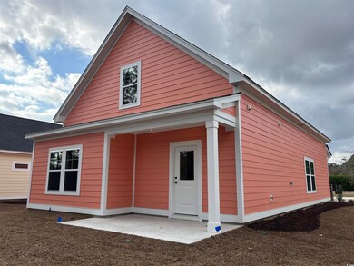 Rear view of house featuring a patio area