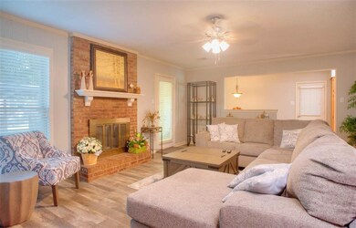 20x16 Den/Family Room with Fireplace and   Laminat