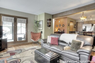 Doors lead to Sunroom off of Living Room