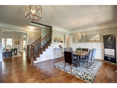 Open formal living room with 8 inch solid oak floo