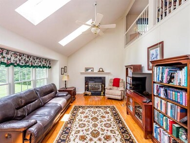 Family room with vaulted ceilings and loft space a