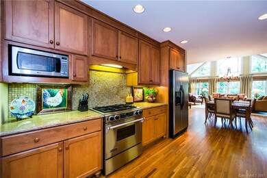 Custom, ceiling height kitchen cabinets with addit