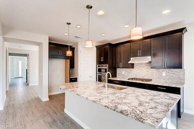 14339 W Charter Oak Rd-large-007-5-Kitch