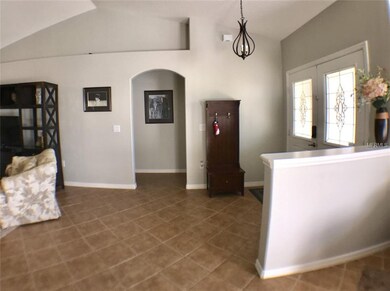 Spacious foyer with ceramic tile throughout.