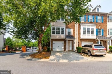 This end unit offers a one-car garage plus parking for two additional cars in the driveway, providing plenty of space for residents and guests.