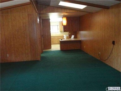 A view from the living room area looking back towa