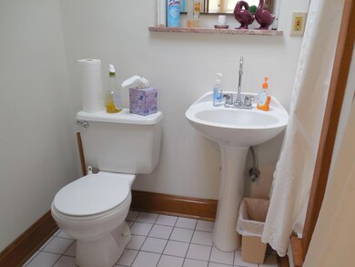 First Floor Half Bath with Skylight!
