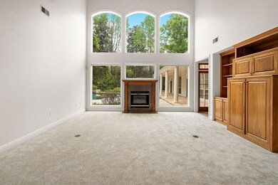 Main living space with gorgeous high ceilings and
