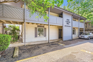 View of building exterior featuring uncovered par