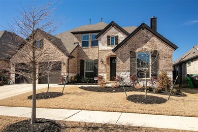 A lovely stone and brick exterior with great lands