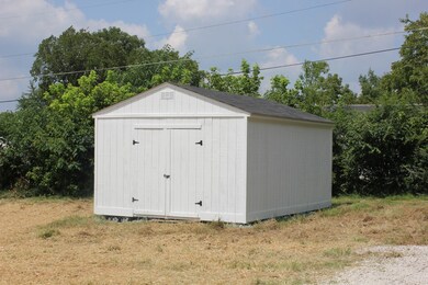 Large Outbuilding in Back Yard