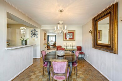 Formal dining room looks onto the living room.  Ma