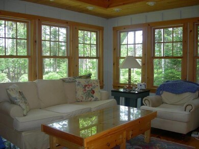 Living room with walls of windows...