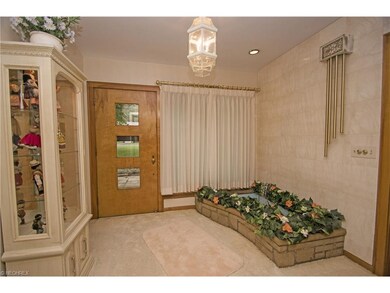 The welcoming entryway has a fountain!